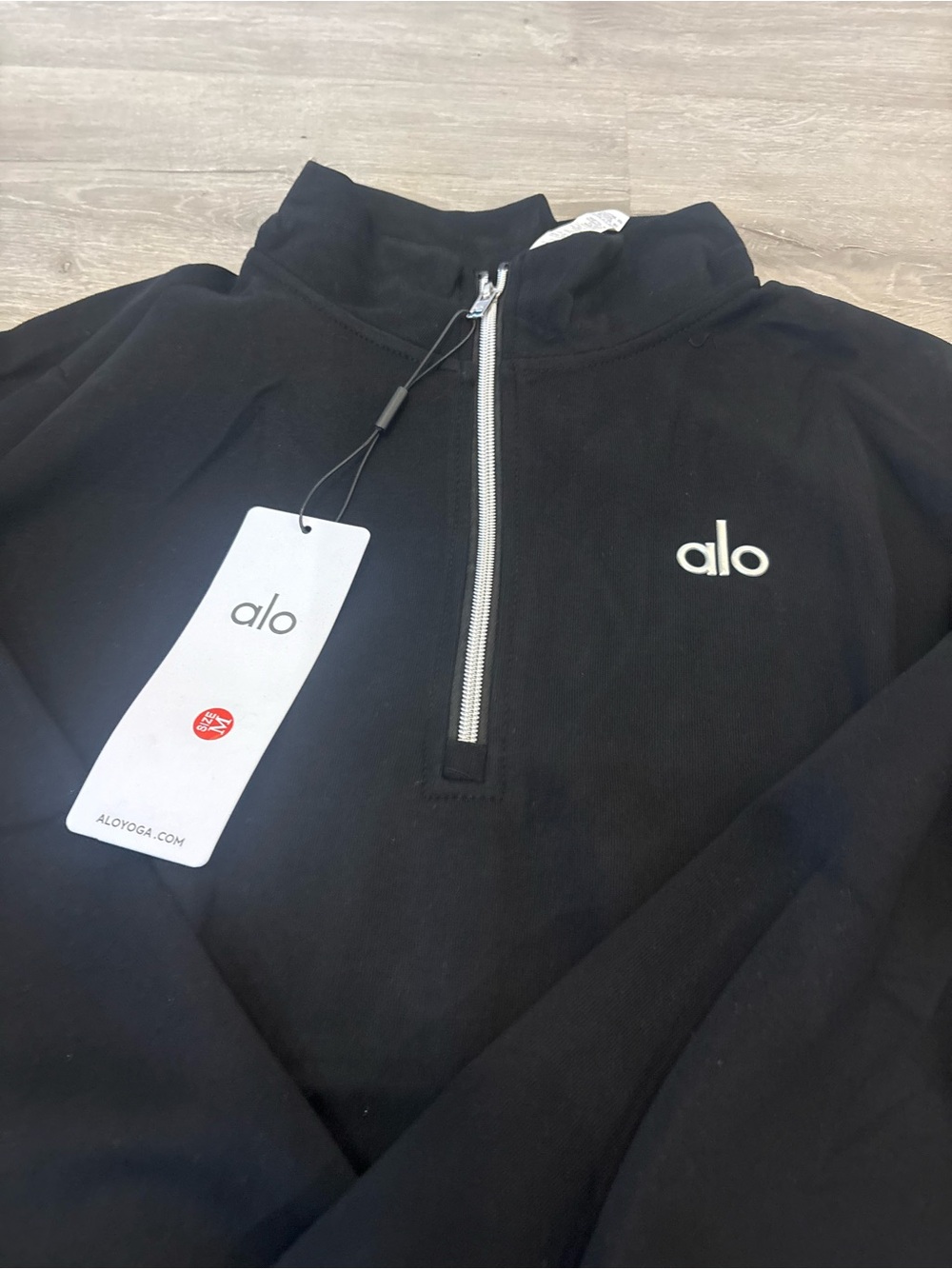 ALO Yoga Black Sweatshirt with White Tag Logo